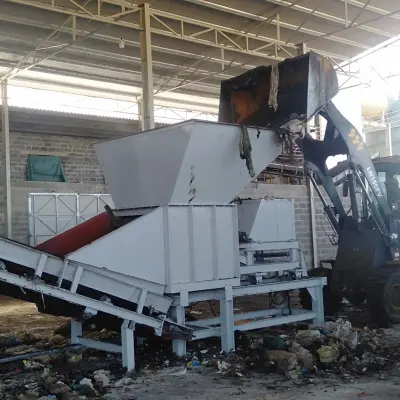 Thiết bị xé búi rác